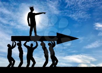 The silhouette of a selfish man with a crown on his head indicates to people who carry him, where to move. The concept of selfish behavior towards other people