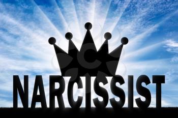 Silhouette of the Big Crown lies on the word Narcissist. Concept of narcissism as a social problem
