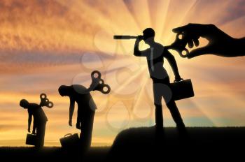 The concept of competition and new ideas in business. Silhouette of a businessman looking through a telescope with a clockwork mechanism at the back on the background of the tired businessmen