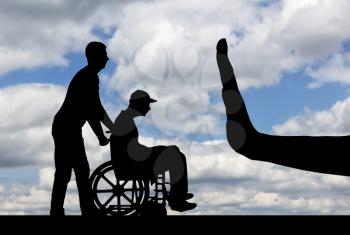 Silhouette of sad disabled man in wheelchair with nurse and hand gesture stop. The concept of care and care for people with disabilities