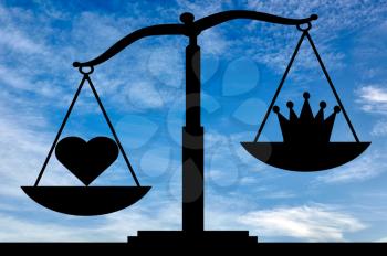 Heart symbol altruism is in priority over the crown egoism symbol on the scales. The concept of choosing to be selfish or altruistic