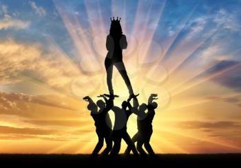 Silhouette of a selfish and narcissistic woman with a crown on her head standing on the hands of men. The concept of selfishness and narcissistic personality