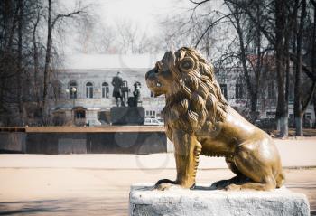 Lion Sculpture in a city park. City Vishny Volochek, Russia.