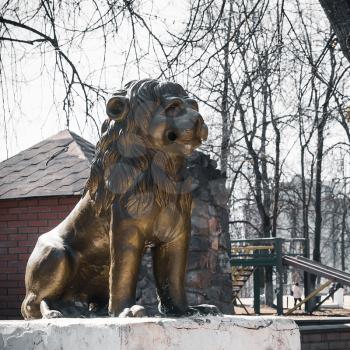 City Vyshniy Volochek, Russia - April 11, 2014: Sculpture of a lion in the city park. Vishny Volochek, Tver region, Russia.