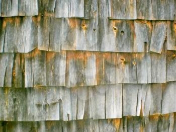 The old wooden texture consisting of separate layers.