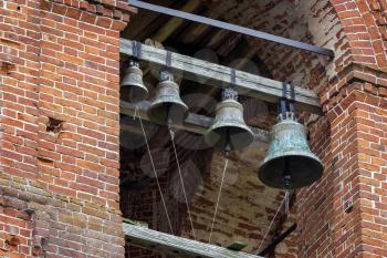 Russian church bells in the bell tower of the Church of the Assumption of the Blessed Virgin in the village of Berezovsky Ryadok, Russia.