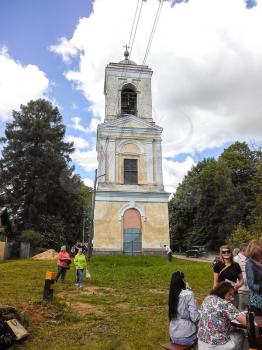 Pryamuhino Selo, Russia - June 17, 2017: The bell tower of the Trinity Church in the village of Pryamukhino. Tver Region, Russia. Mobile photo.