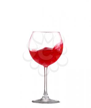 red wine splashing in a glass, isolated on white