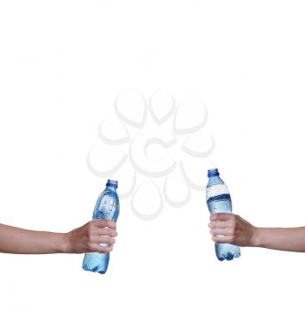Man's hand holding a bottle of water