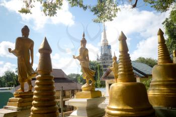 The top of Tiger Cave temple, Wat Tham Suea , Krabi region, Thailand. At the top of the mountain there is a large golden Buddha statue which is a popular tourist attraction.