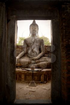 Historic Town of Sukhothai, Sukhothai Historical Park, Wat Si Chum, Thailand. sitting buddha statue.