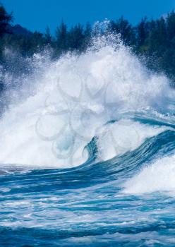 Dramatic powerful waves crash onto sand on dangerous beach at Lumaha'i, Kauai, Hawaii