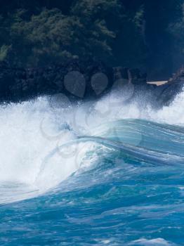 Dramatic powerful waves crash onto sand on dangerous beach at Lumaha'i, Kauai, Hawaii