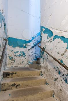 Stairs in staircase inside Trans-Allegheny Lunatic Asylum in Weston, West Virginia, USA