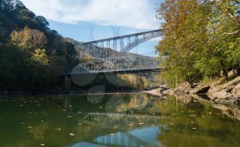 Fayette Station Road bridge by the high arched New River Gorge bridge in West Virginia