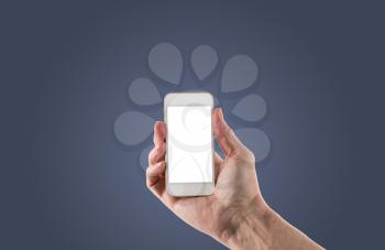 Image of male right hand holding smartphone with screen isolated ready for insertion of your application or screenshot against blue gradient background