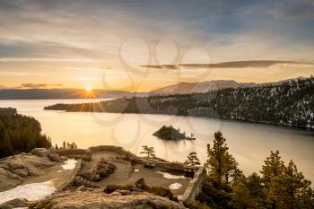 Sunrise at Emerald Bay on Lake Tahoe between California and Nevada with snow covered Sierra Nevada Mountains