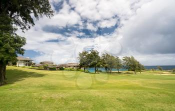 Coastline and housing development on golf course with large luxury single family homes at Makaluapuna Point near Kapalua, Maui, HI, USA