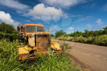 Old and abandoned rusting truck used for sugar cane to Koloa sugar mill on Hawaiian island of Kauai