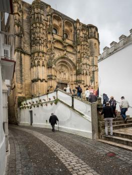 Tourists at Church of Santa Maria in Arcos de la Frontera near Cadiz in Spain