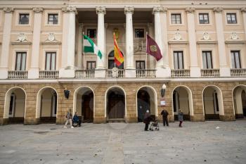 Local people outside the town hall of the city of Cadiz in Southern Spain