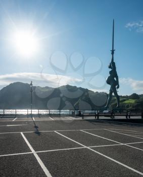 ILFRACOMBE, DEVON UK - JULY 24:  Sun illuminated Verity on 24 July 2017 in Ilfracombe, UK. The 25m tall Damien Hirst statue Verity was erected in 2012