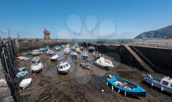 LYNMOUTH, DEVON UK - JULY 24:  Mud in harbor at low tide on 24 July 2017 in Ilfracombe, UK. The village was disastrously flooded in August 1952.