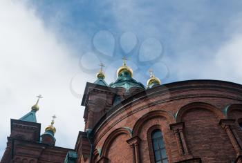 Gold domes on Eastern Orthodox Uspenski Cathedral in Helsinki, Finland