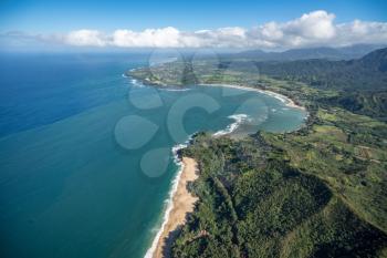 Aerial view of Hanalei Bay and Lumaha'i beach on hawaiian island of Kauai from helicopter flight
