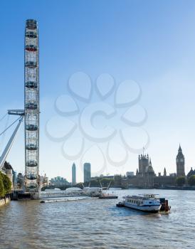 LONDON, UK - OCTOBER 1, 2015: London Eye on South Bank of River Thames in London England