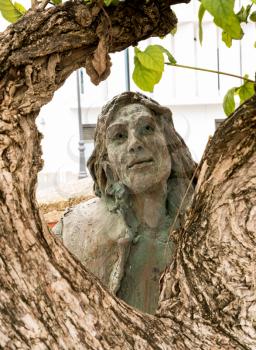 SAN JUAN, PR - MARCH 4, 2018: Statue by unknown artist of man on Calle Recinto Sur in San Juan, Puerto Rico.