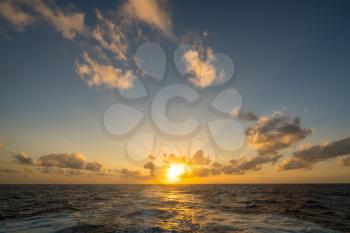 Sunset over the wake of a cruise ship crossing the Atlantic
