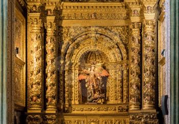 Detail of George and Dragon carvings inside cathedral in Funchal on island of Madiera