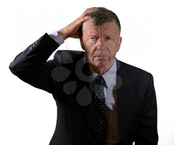 Front view and face of senior caucasian man worried and afraid with hand on head