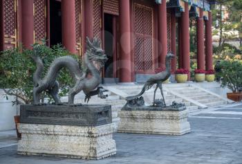 Dragon and peacock statues at the Emperor Summer Palace in Beijing, China