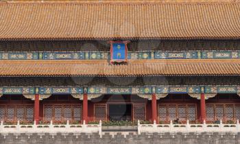 Details of the pottery roof tiles and carvings on Meridian Gate in the Forbidden City in Beijing