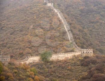 Great Wall of China at Mutianyu stretches for miles over the wooded slopes