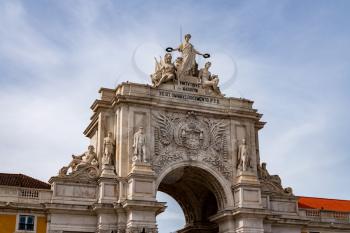 Ornate palace entrance to the city in Praca do Comercio or Terreiro do Paco in downtown Lisbon