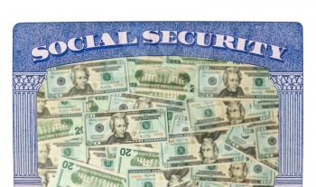 Concept of social security and retirement funding issues in USA with many US dollars laid out in inside the framework of a social security card