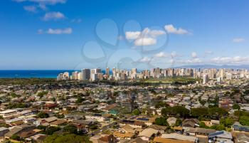 Aerial drone view of suburbs of Kaimuki and Waikiki with Honolulu in the background