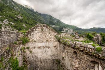 Stone walls of Kotor Fortress above the old town in Montenegro