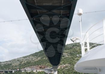 Cruise ship docked under the Franjo Tudman bridge in the Dubrovnik cruise port near the old town