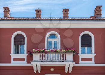 Balcony on the town hall in the coastal town of Novigrad in Croatia