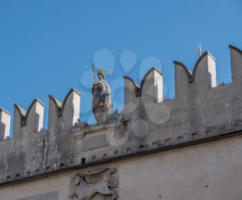Koper, Slovenia - 24 May 2019: Statue of Justice on the top of the Praetorian palace in the old town of Koper in Slovenia