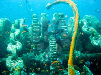 Old chain lifting mechanism anchors on a sunken ship