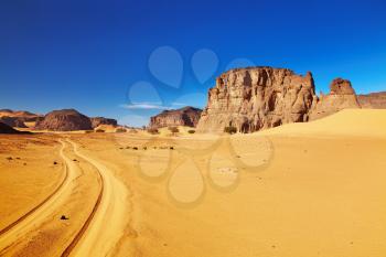 Desert landscape with rocks and blue sky, Tadrart, Algeria
