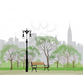 Bench and streetlight in park over city background.  Landscape of Central Park in New York. USA.