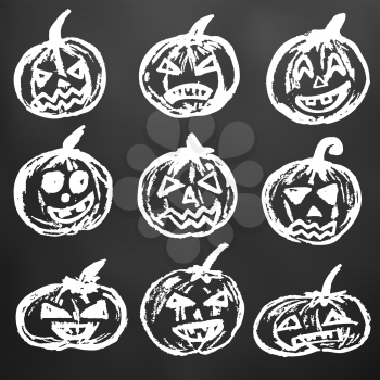 Halloween. A set of festive pumpkins. White chalk on a blackboard. A collection of funny faces. Autumn holidays. Fun