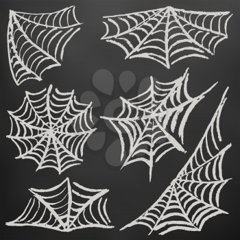 Halloween. Set cobwebs. White chalk on a blackboard. Collection of festive elements. Autumn holidays. Fun