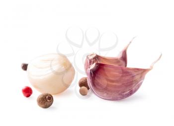 Garlic cloves and pepper on a white background 